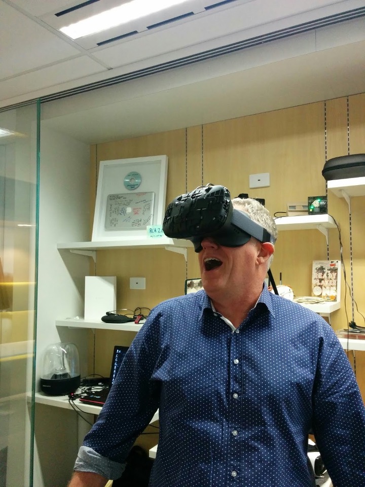 Nigel Dalton mid-demo in a VR headset